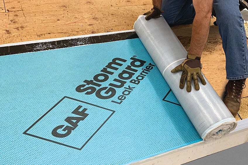 GAF Storm Guard Leak Barrier Being Installed on a Roof
