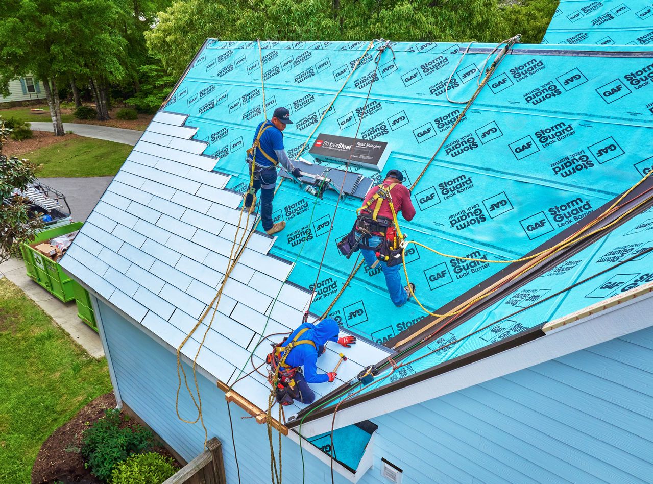 GAF roofing products StormGuard and TimberSteel being installed on a roof.