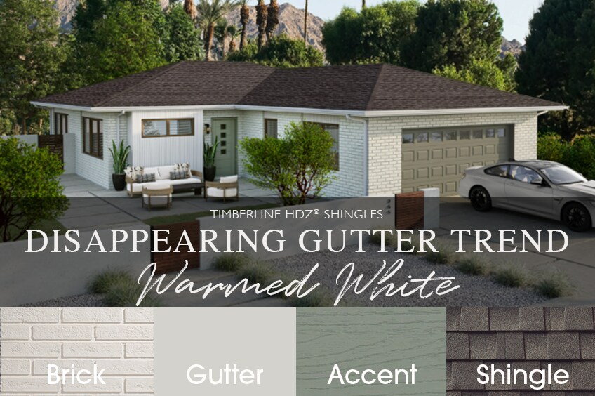 Close-up of a modern home featuring a cream gutter system and window, showcasing sleek architectural