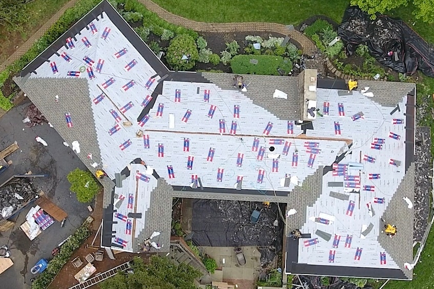 New roof installation showing underlayment