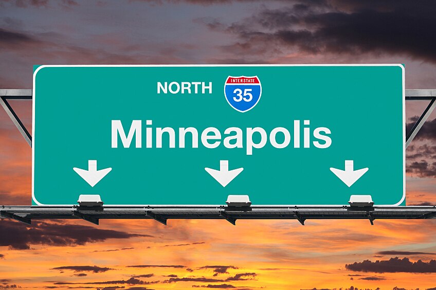 Minneapolis Interstate 35 north highway sign with sunrise sky