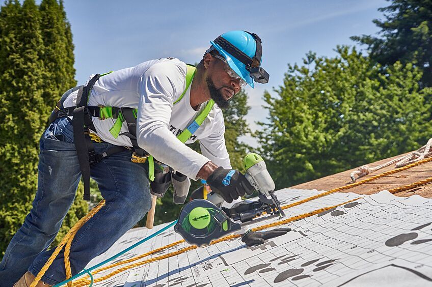 Roofer working on a roof