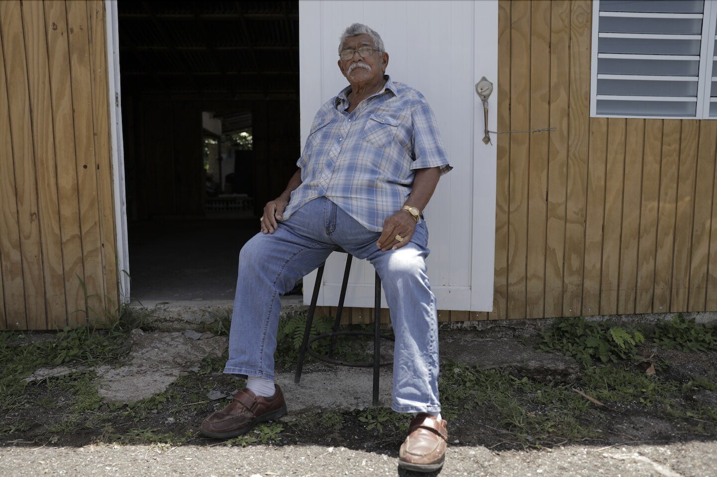 Puerto Rican Resident, Mr Alfredo Outside of His Home