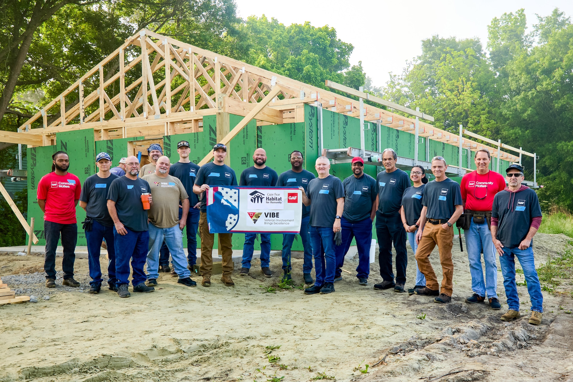 GAF Burgaw VIBE Group in front of a Habitat for Humanity build