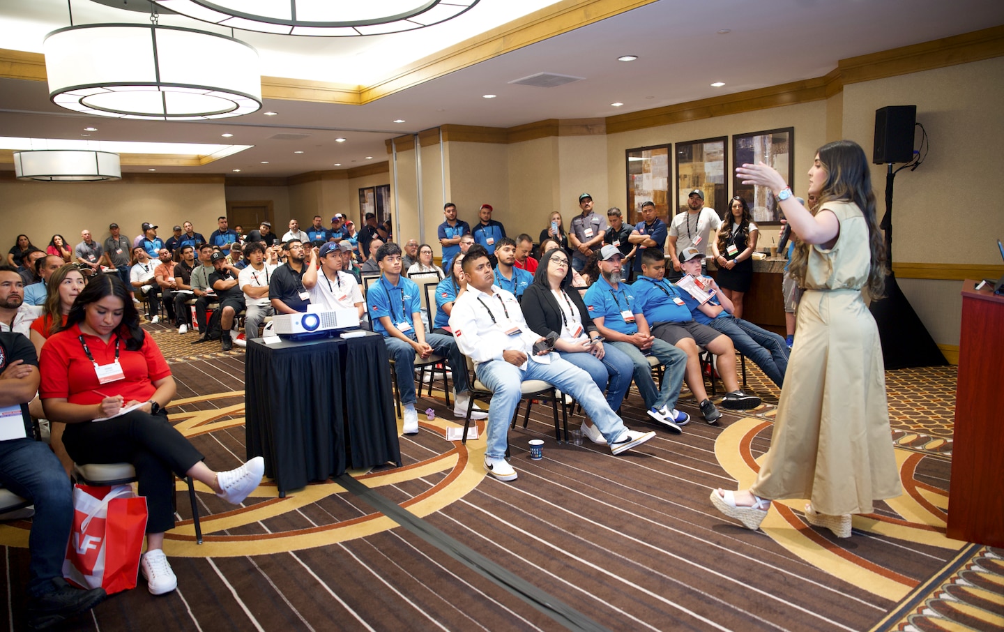 Attendees watch a presentation at the 2024 LA Latinos in Roofing Expo