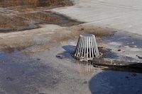 A commercial roof drain.