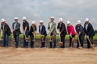 Employees being trained in new manufacturing facility.