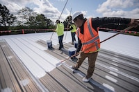 A GAF CoatingsPro+™ Contractor installing GAF products on a roof