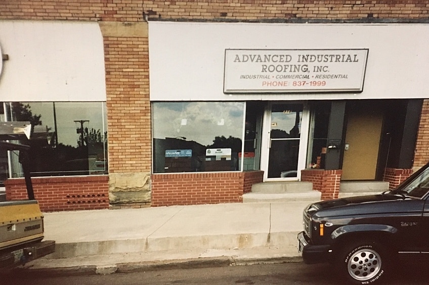 A commercial roofing contractor stapling roof.