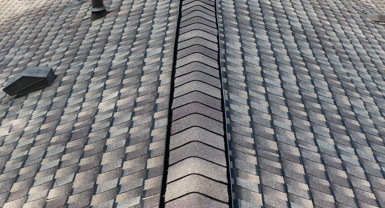 A Ridge Vent and Attic Ventalation Installed on a Roof