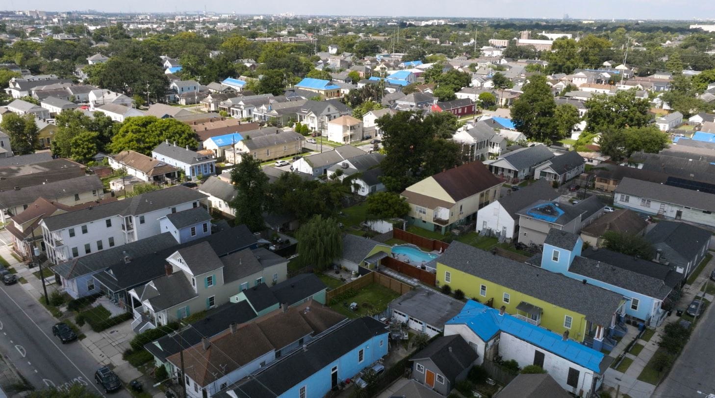 blue tarps on roofs Blue tarps on roofs over new orleans
