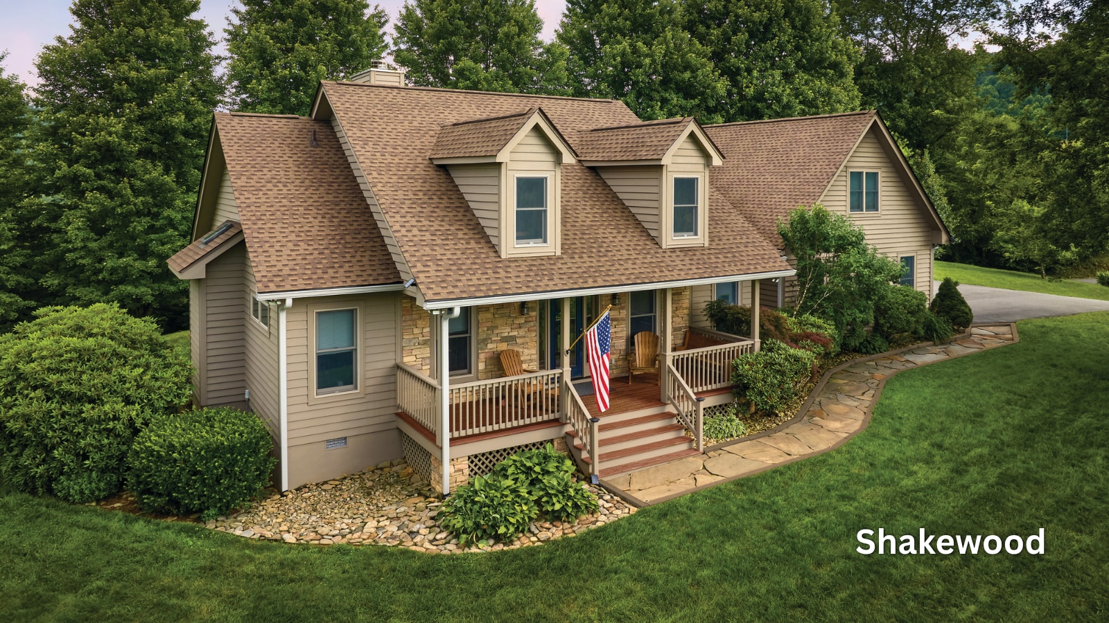 e30a3968-a74d-4bae-840b-802c64cd7995 GAF Timberline HDZ shingles in the color Shakewood on the roof of a home.