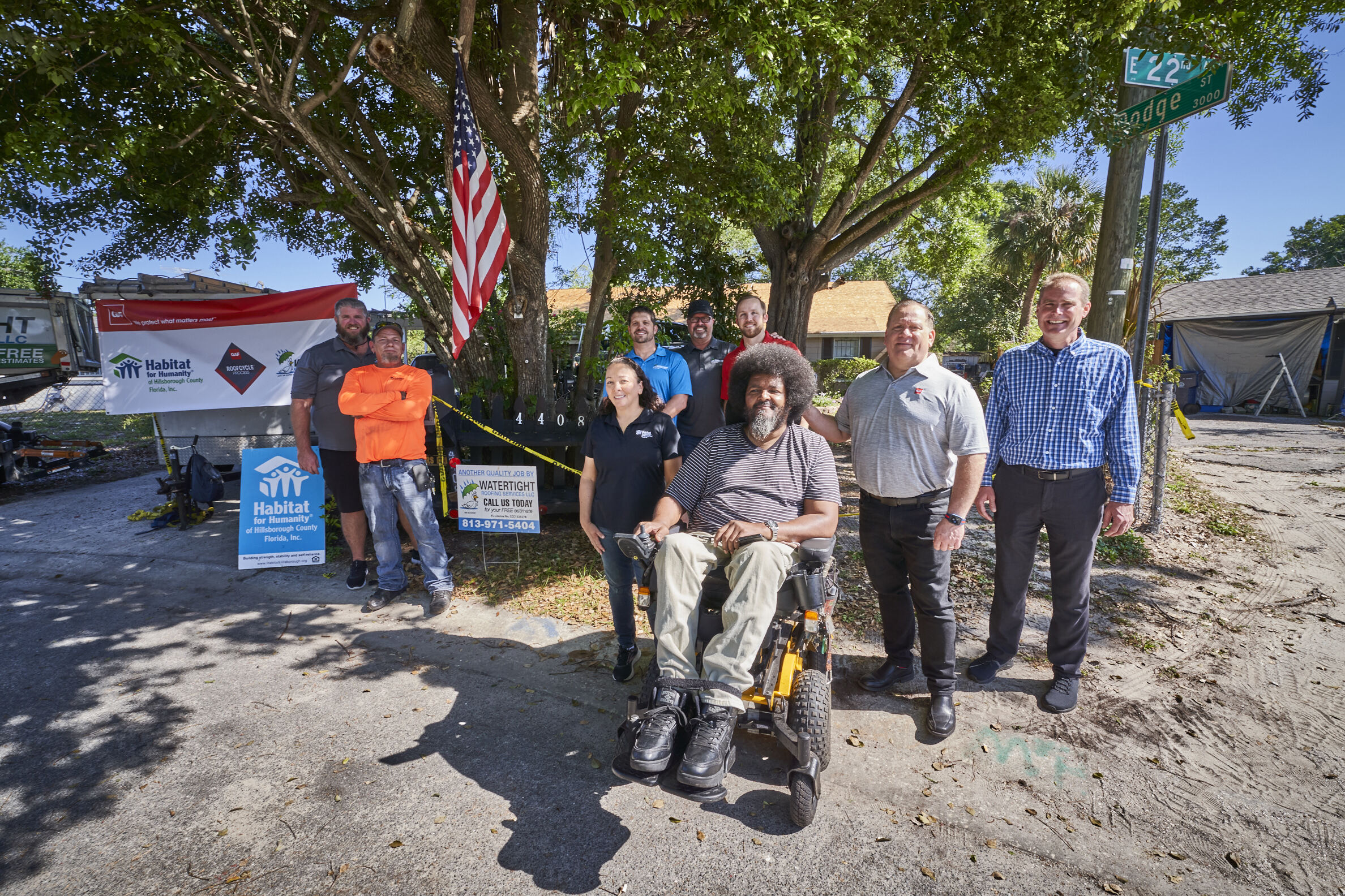 1st ras recipient posing with GAF team in front of house