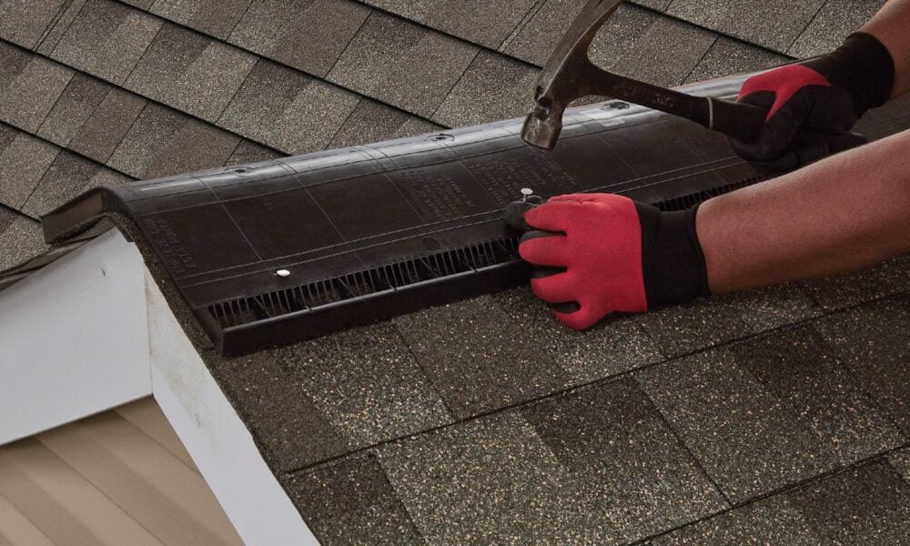 ridge vent installation on the roof of a house.