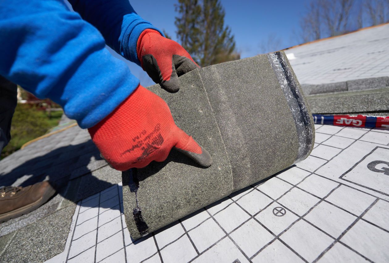 95ef80ce-3183-4fec-952f-b8315855a7e0 Intalling roofing shingles requires precision when nailing the shingles.
