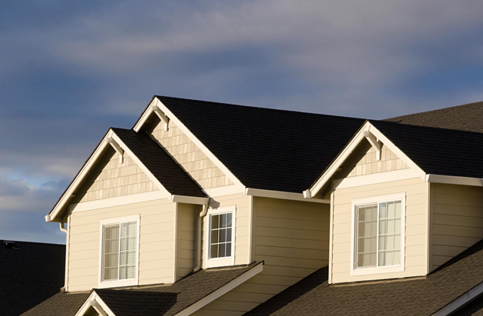 Gable roof with cloudy sky