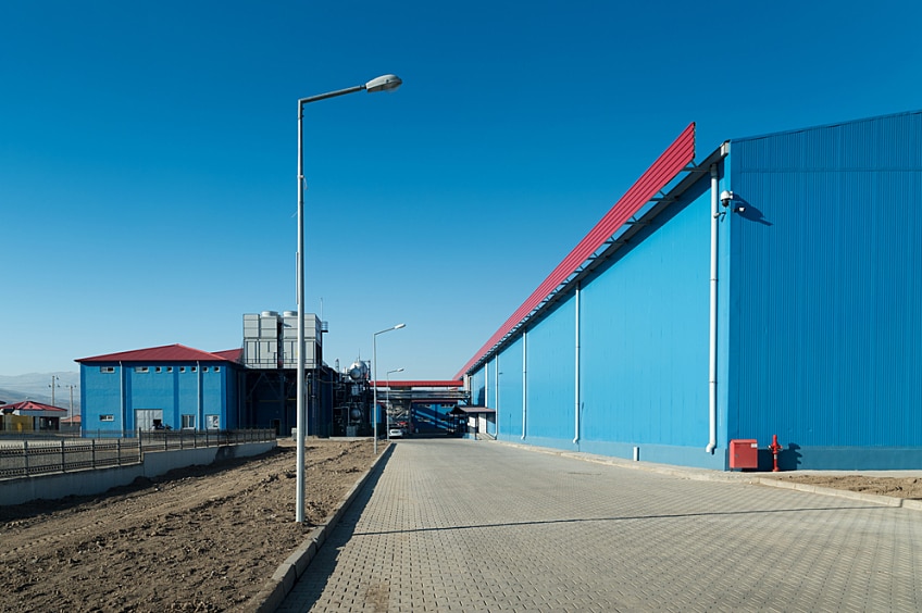 Two blue cold storage buildings