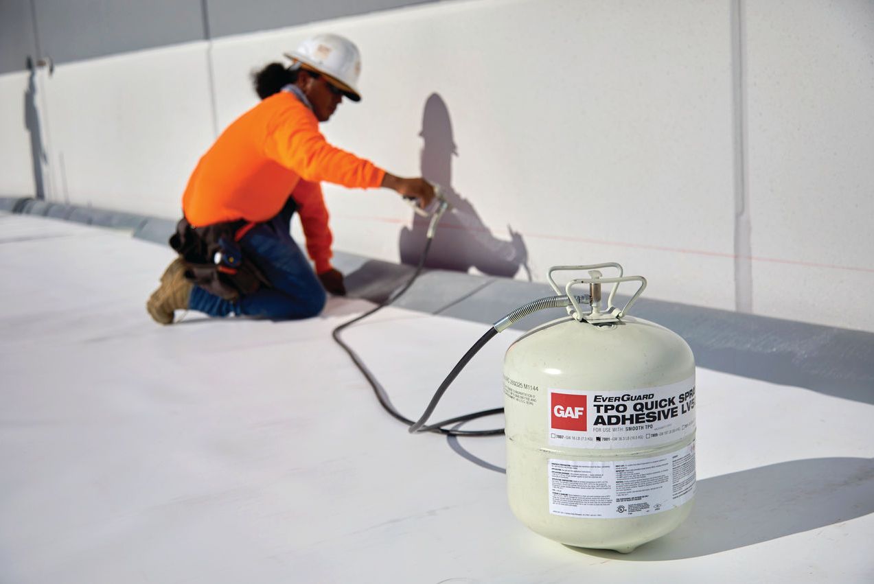 8b05a04a-5275-493b-952b-cb1be170bc72 PVC Roof install using GAF's Quick Spray Adhesive